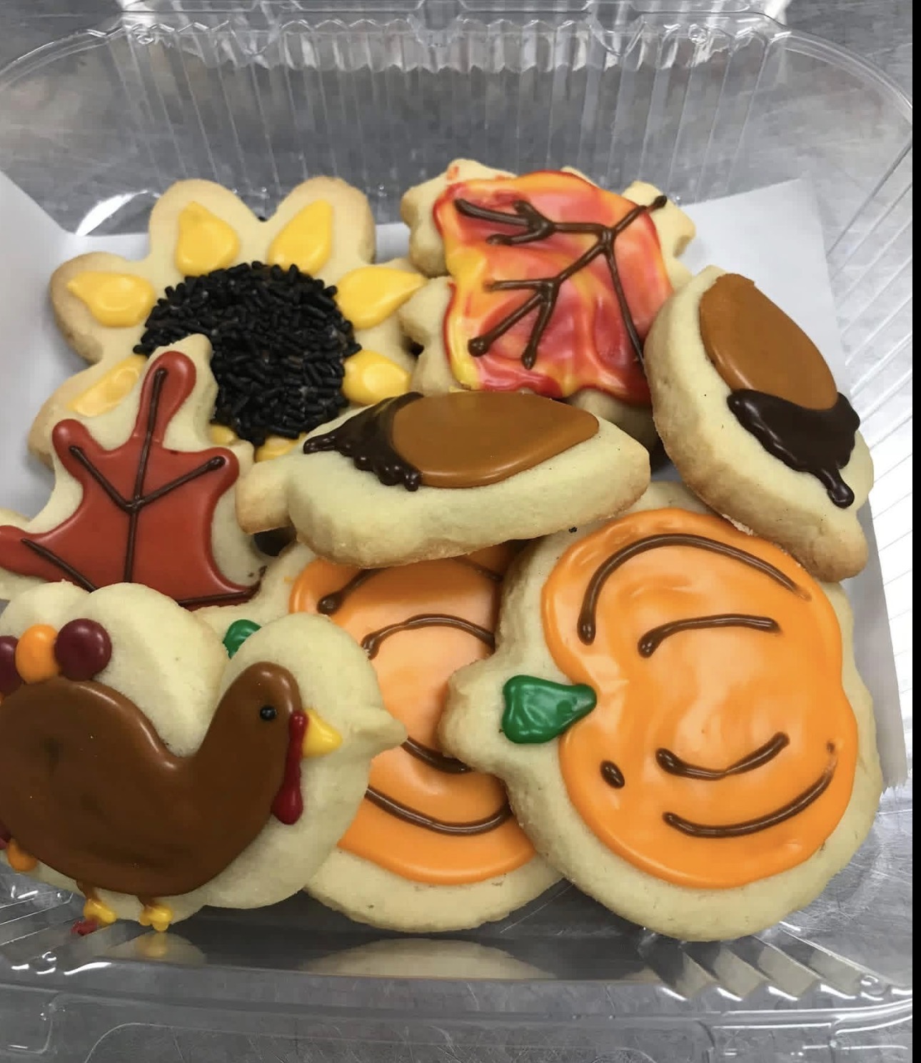 Fall sugar cookies with turkeys, pumpkins, sunflowers, acorns and maple leaves